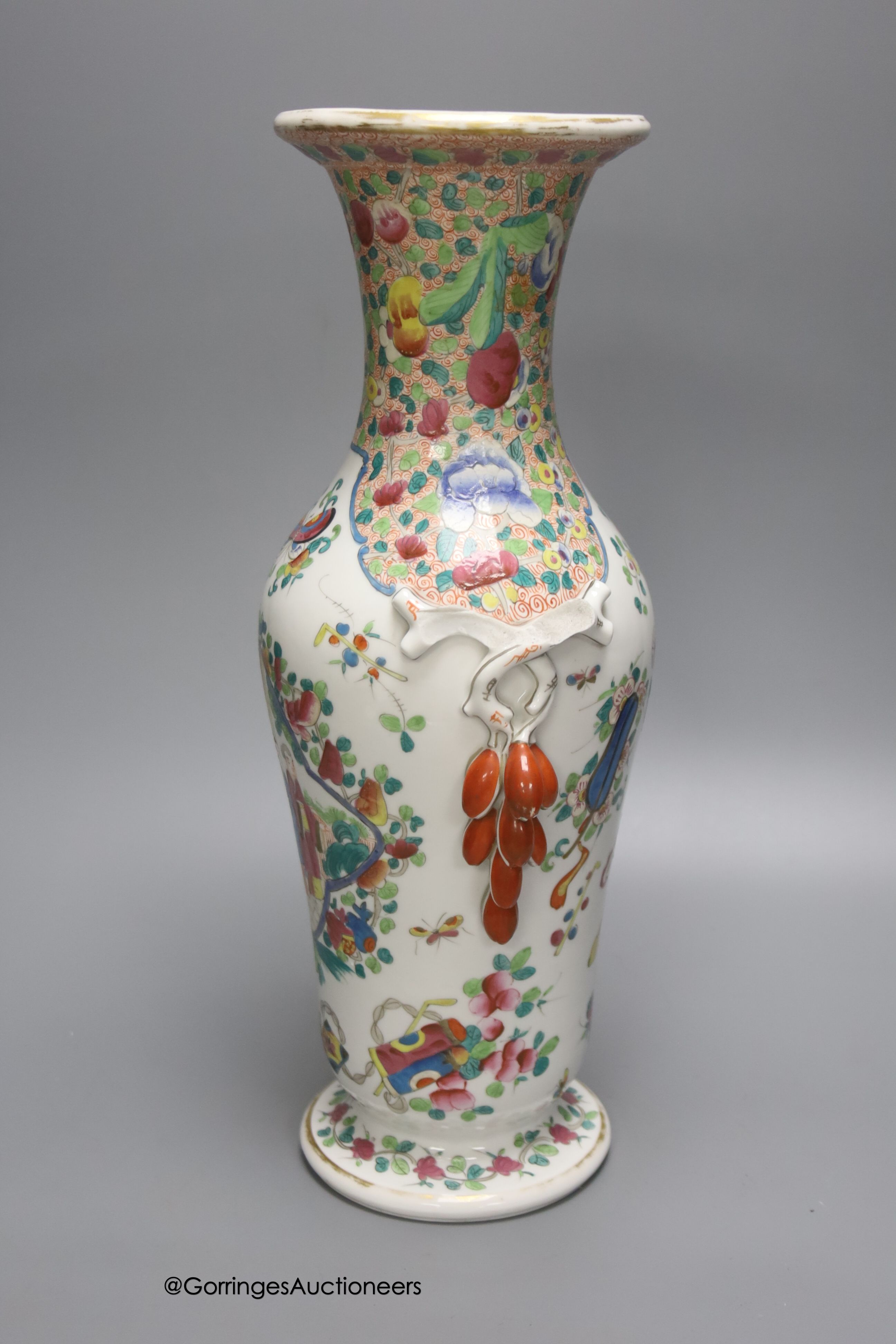 A 19th century French porcelain vase, enamelled in Chinese famille rose style, 38cm